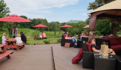 picnic tables with umbrellas